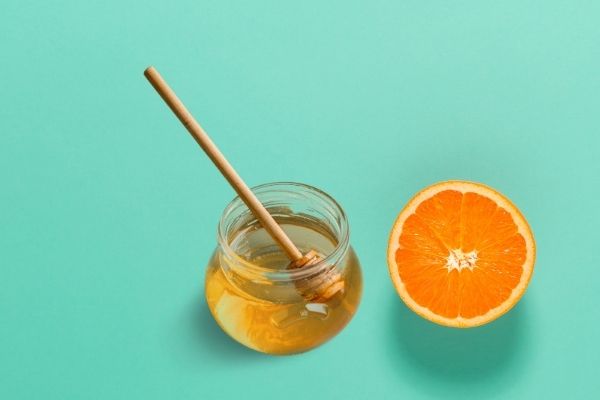 Cách giảm nếp nhăn bằng cam quýt và mật ong